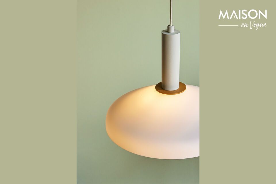 The Apollo orange glass pendant brings a touch of bright, warm color to any space