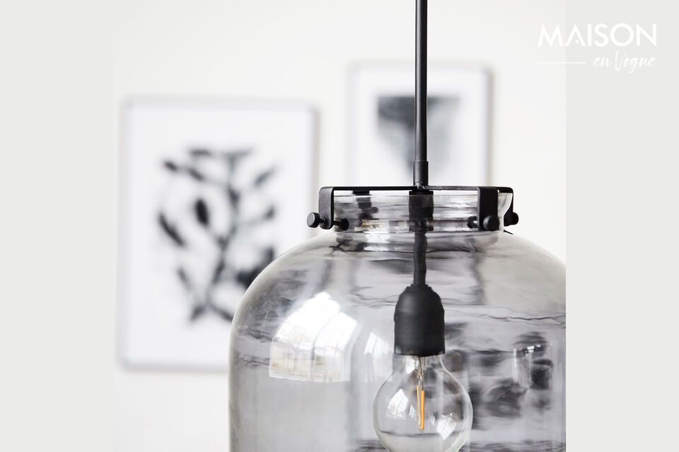 The Ball gray glass pendant combines elegance and contemporary design to illuminate and add a