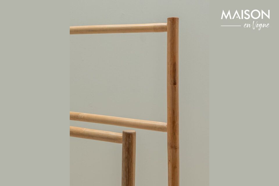 Made from bamboo, a material renowned for its sturdiness and lightness, this coat rack weighs just 3