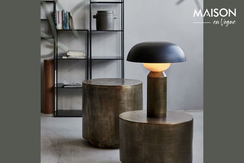 Introduce a touch of sculptural elegance to your home with the Big Fellow table lamp