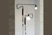 Miniature Black brass wall light Swing 3