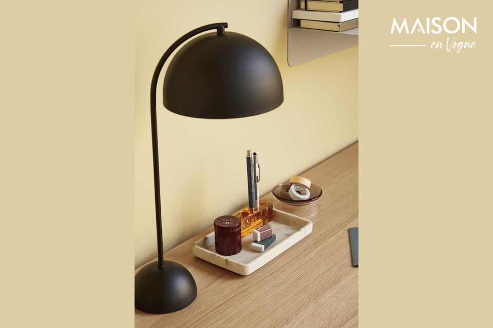 Illuminate your space in style with the Form black metal table lamp