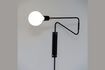 Miniature Black metal wall light Swing 1