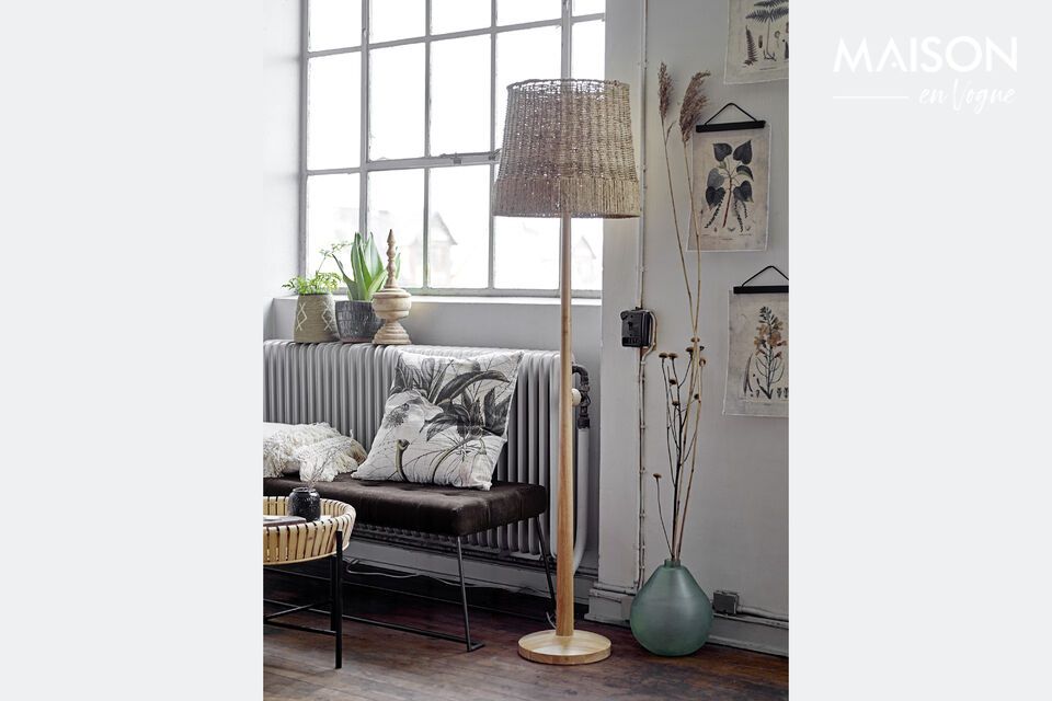 A rattan and wooden floor lamp