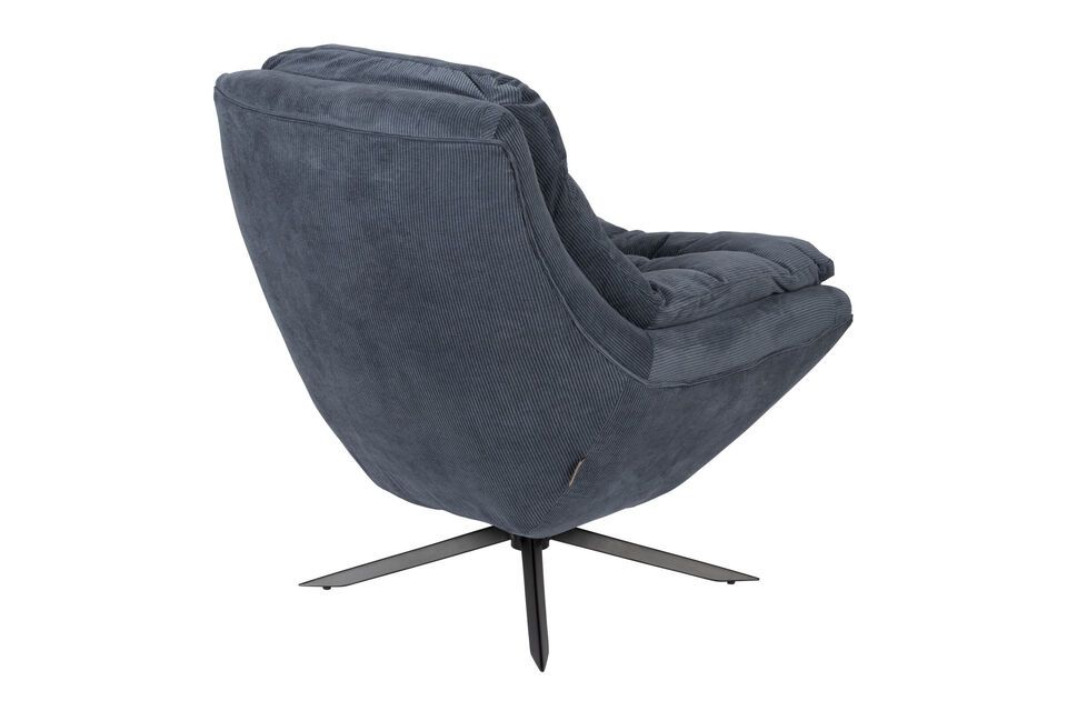 Dressed in a deep blue, this armchair brings a subtle, refined touch of color to your living space