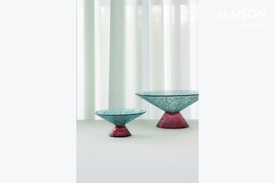 The large blue glass Bonbon bowl combines a smooth finish with a contemporary look