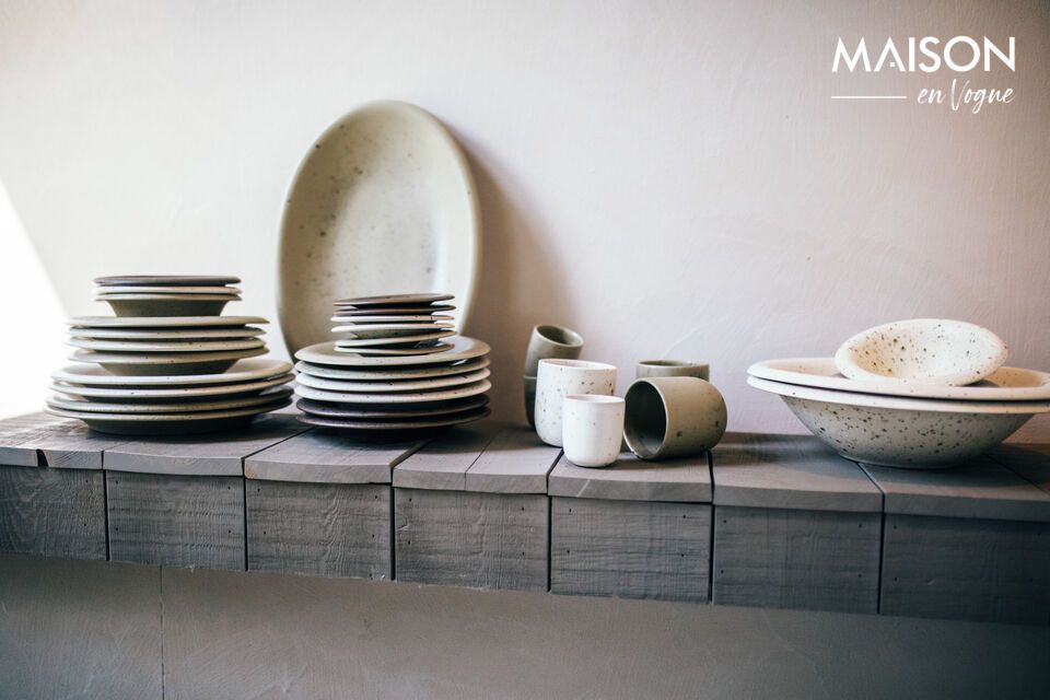 Our olive-colored stoneware plate brings a touch of minimalist refinement to any table