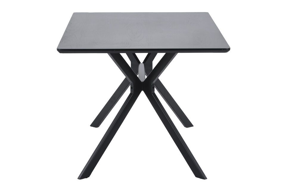 The Bruno Dining Table in Black is a stylish and spacious piece of furniture that adds a touch of