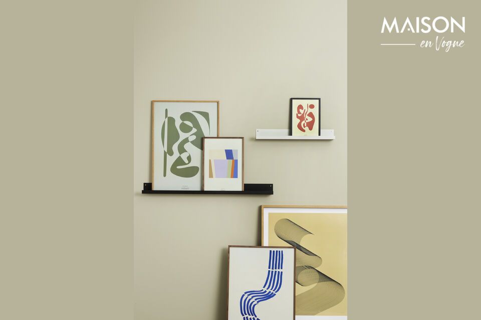 This small, light-gray metal frame stand transforms any wall into a personal art gallery