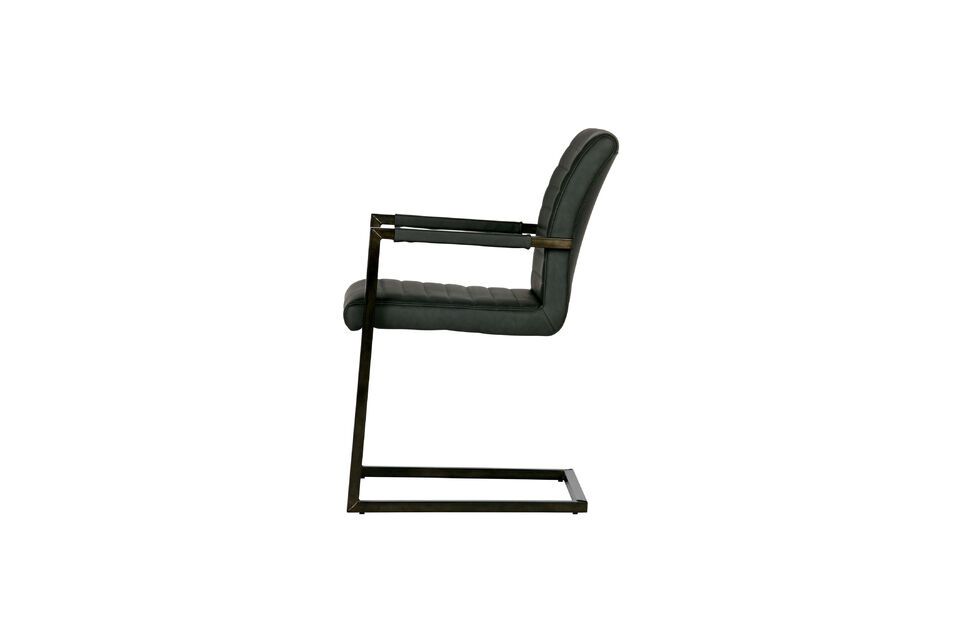 Black low chair, leather and metal, vintage and modern at the same time