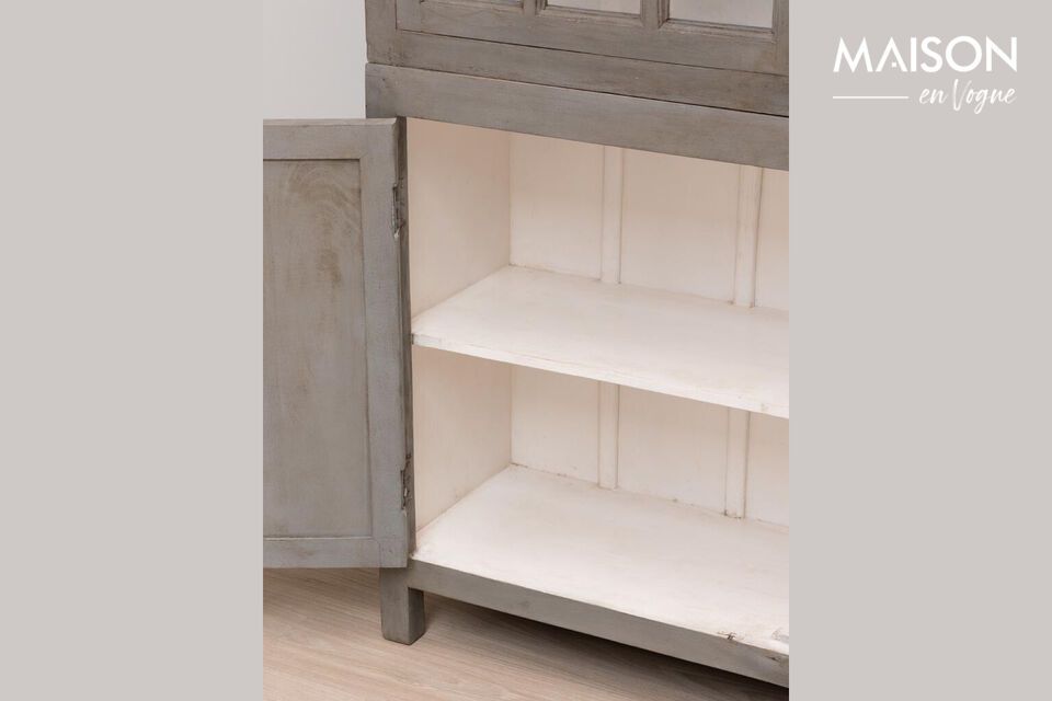 Discover elegance and functionality combined with our beautiful gray-stained mango cabinet