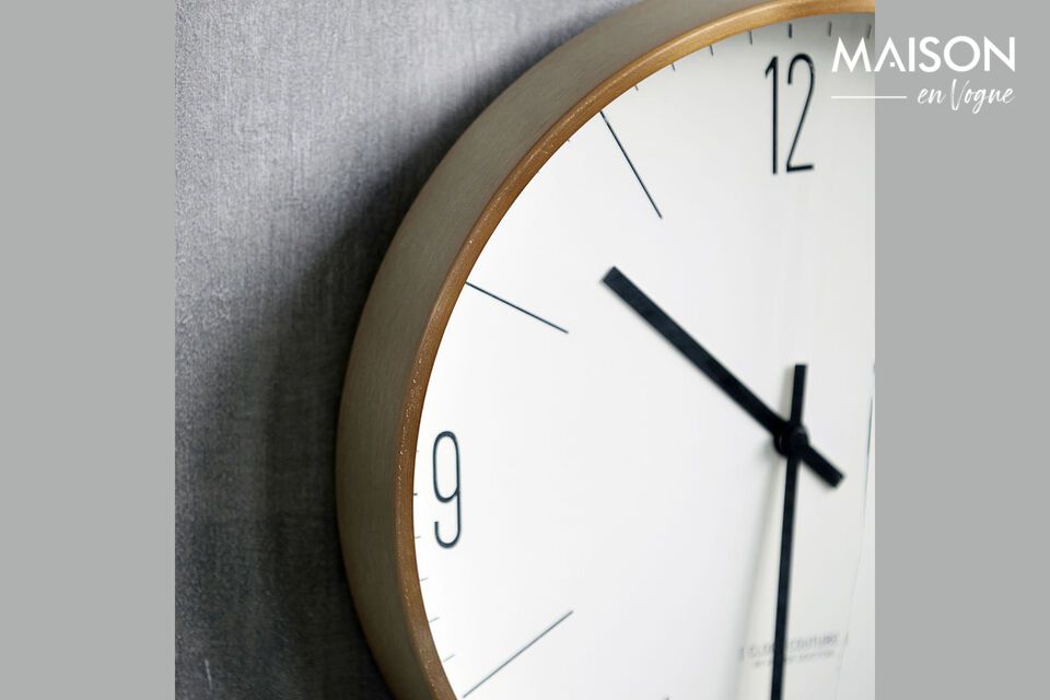 Bring a touch of contemporary elegance to your space with the Clock Couture wall clock from House