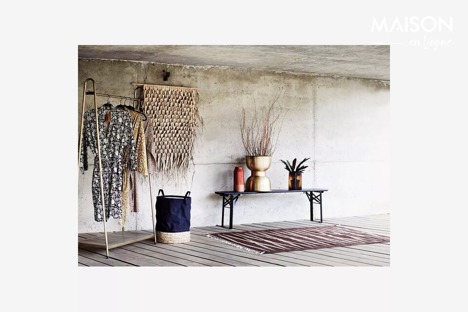 A versatile and stylish clothes rack that complements any home with its sleek and minimalist design.