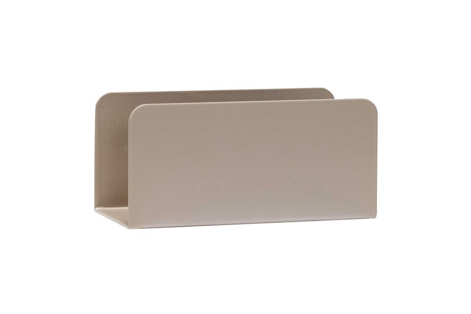 The Clutch magazine rack in sand metal combines functionality and modern design to elegantly store