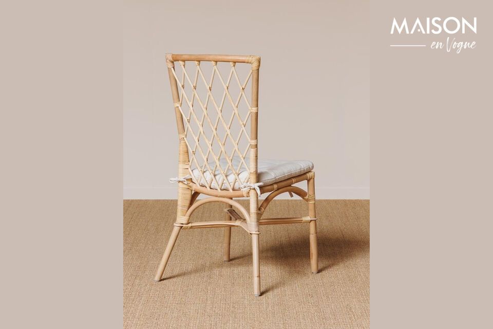 Discover the timeless charm of our Croisillons beige rattan chair