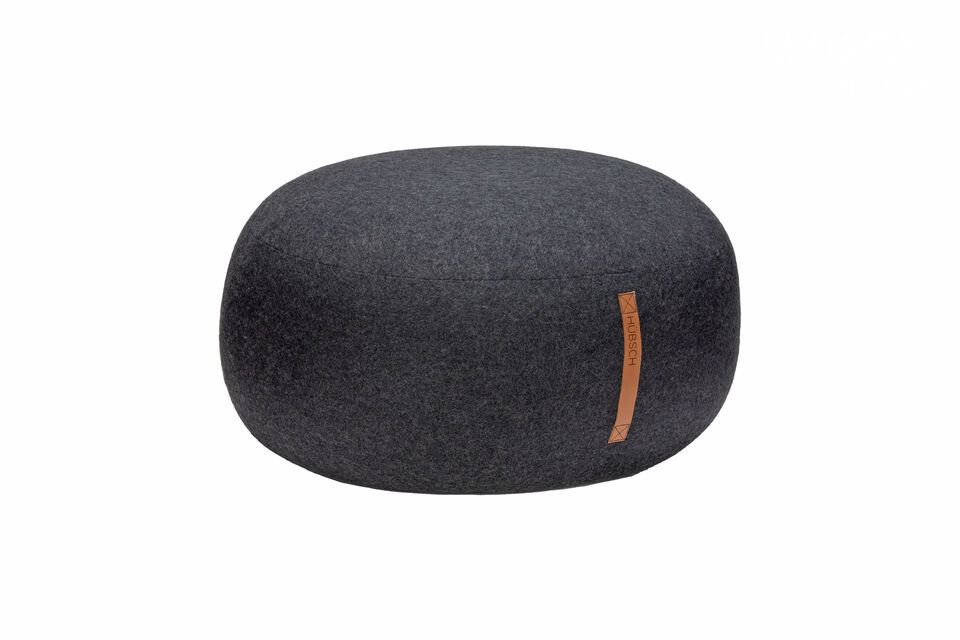 The Mochi pouffe in dark grey offers the perfect blend of functionality and chic style