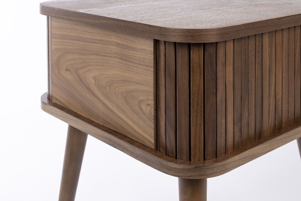 Discover functional elegance with the Barbier dark wood side table