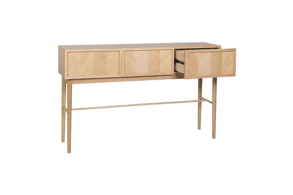 The Herringbone light oak veneer drawer console offers the perfect marriage of timeless aesthetics