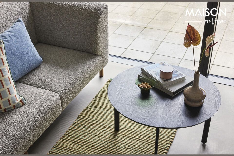 The Fjord black ash wood coffee table combines modern aesthetics with essential functionality