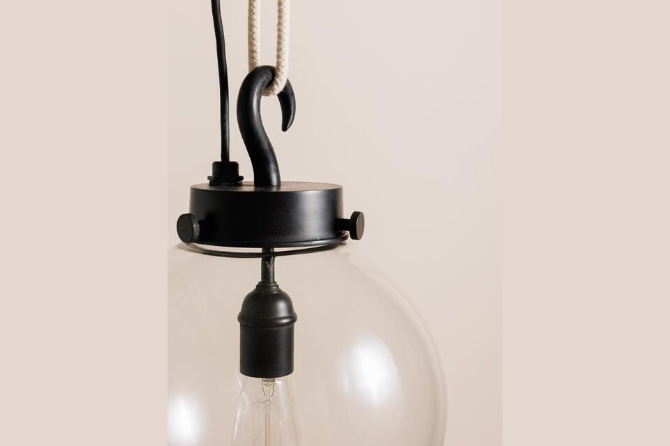 Would you like to bring a touch of elegance and modernity to your interior? Our Globe Brass Pendant