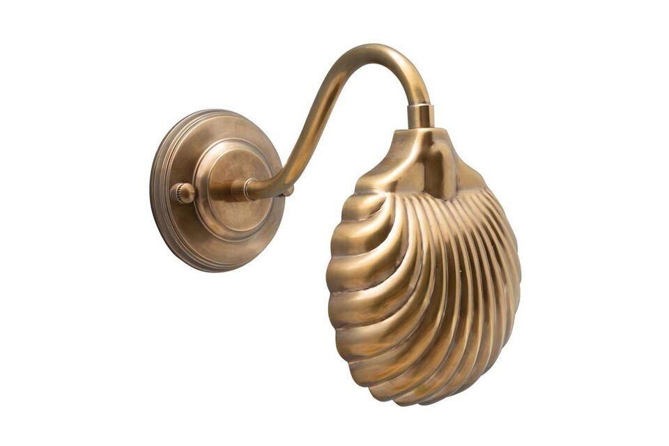 Bring a touch of timeless elegance to your home with this gold-tone brass wall sconce