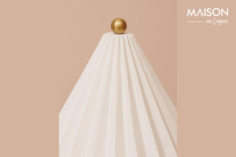 Enhance your decor with a gold metal lamp that's both chic and practical.