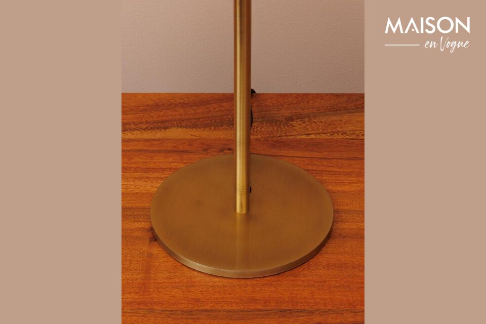 Bring a touch of elegance and sophistication to your home with a gold metal table lamp