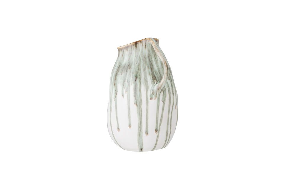 With its 19 cm height and green hues complemented by shades of white and brown