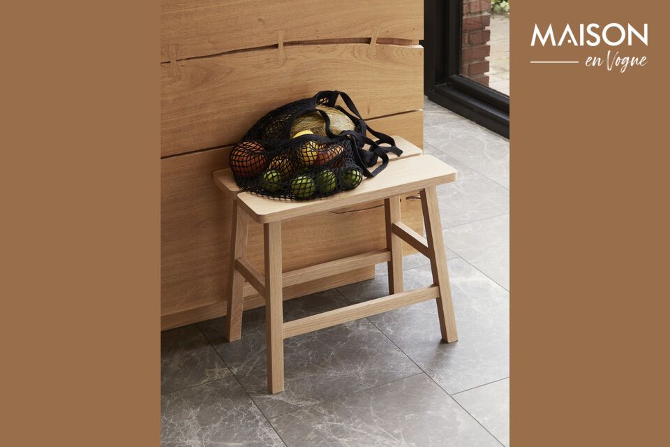 The Ground stool in light oak veneer combines style and comfort with its modern design and padded