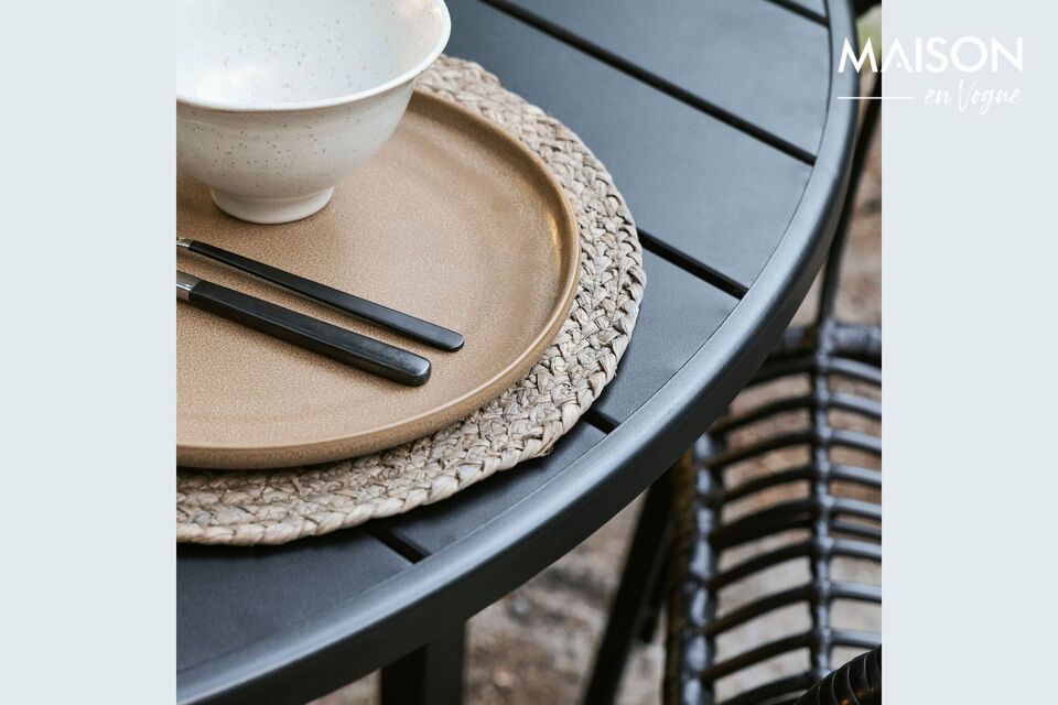 Discover the elegance of the Helo black iron dining table