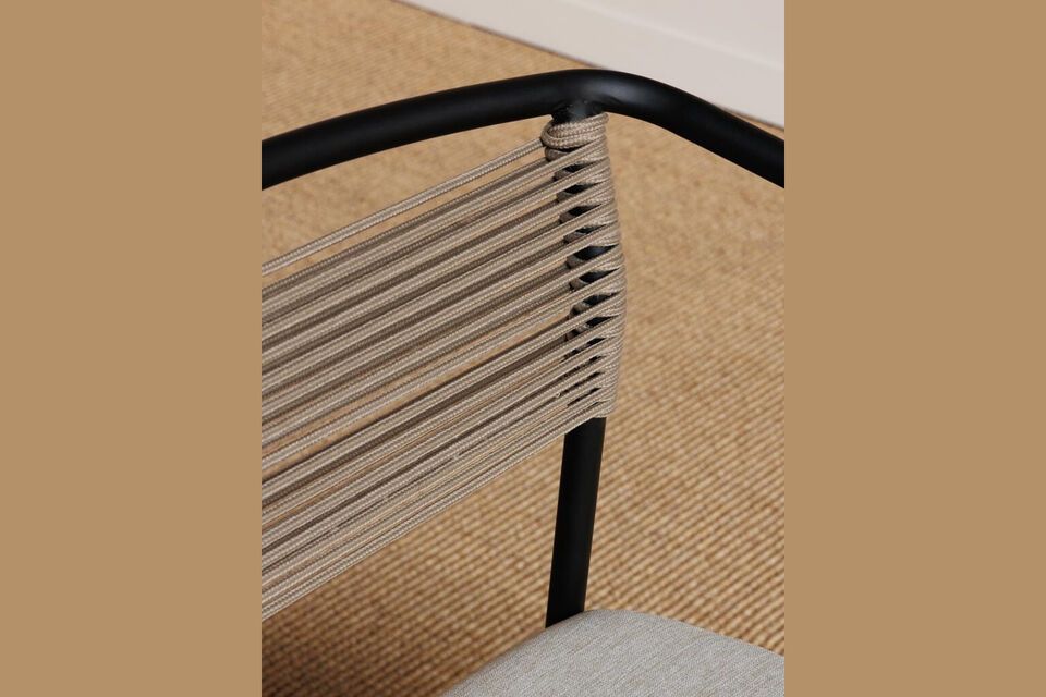 The black metal design of the Icelyn chair adds a touch of modernity while promising durability and