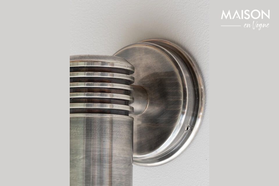 Discover functional elegance with our gray brass sconce