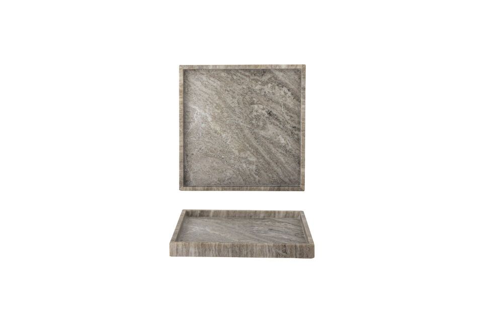 The sober design and warm color of the brown marble blend harmoniously with a variety of decors