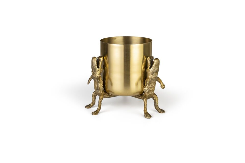 p>The Crocodiles planter in recycled gold aluminum is a centerpiece that fuses the exoticism of