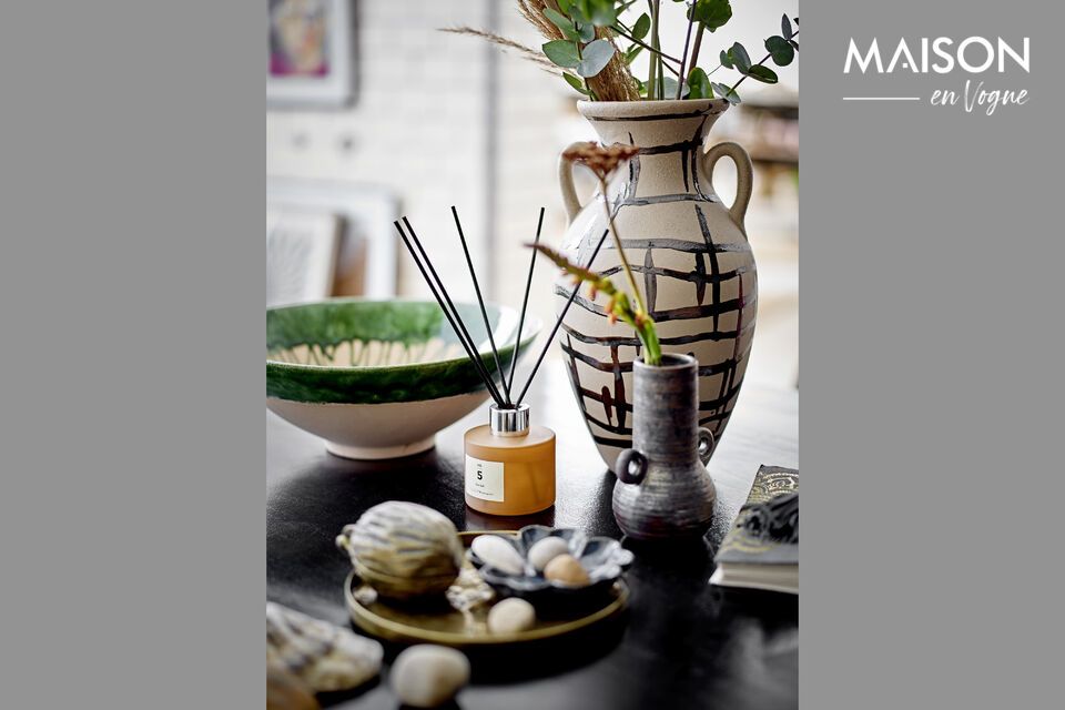 Discover the elegant simplicity and authenticity of the Moez Bowl from Bloomingville