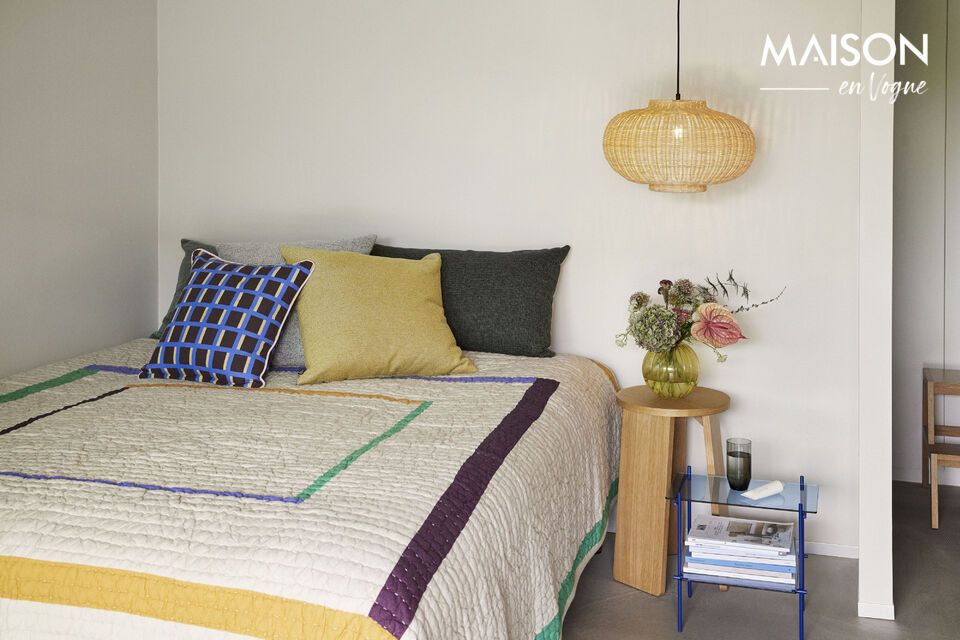 With its stripes and vibrant colors, it brings a touch of playfulness to your bedroom