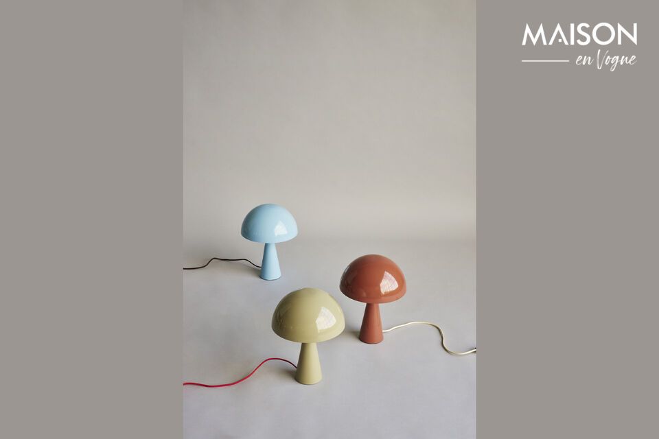 The Mush light blue metal table lamp offers soft lighting and a modern aesthetic for your work or