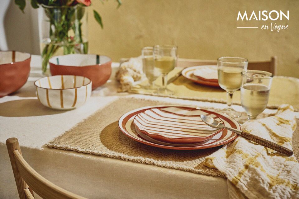 Enhance your desserts with this rust-colored porcelain plate.