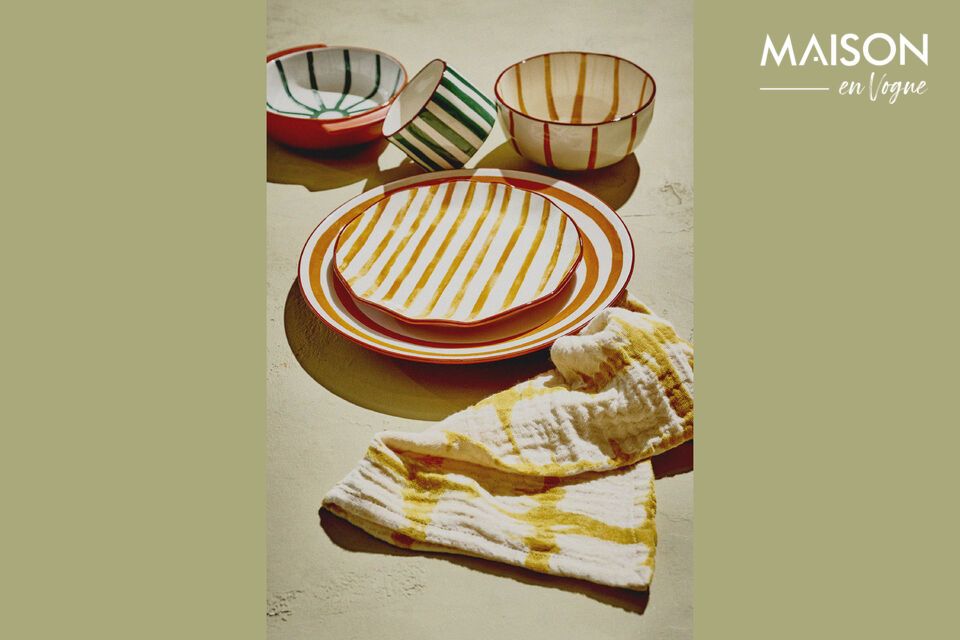 Discover the subtle elegance of the Mykonos yellow porcelain dinner plate