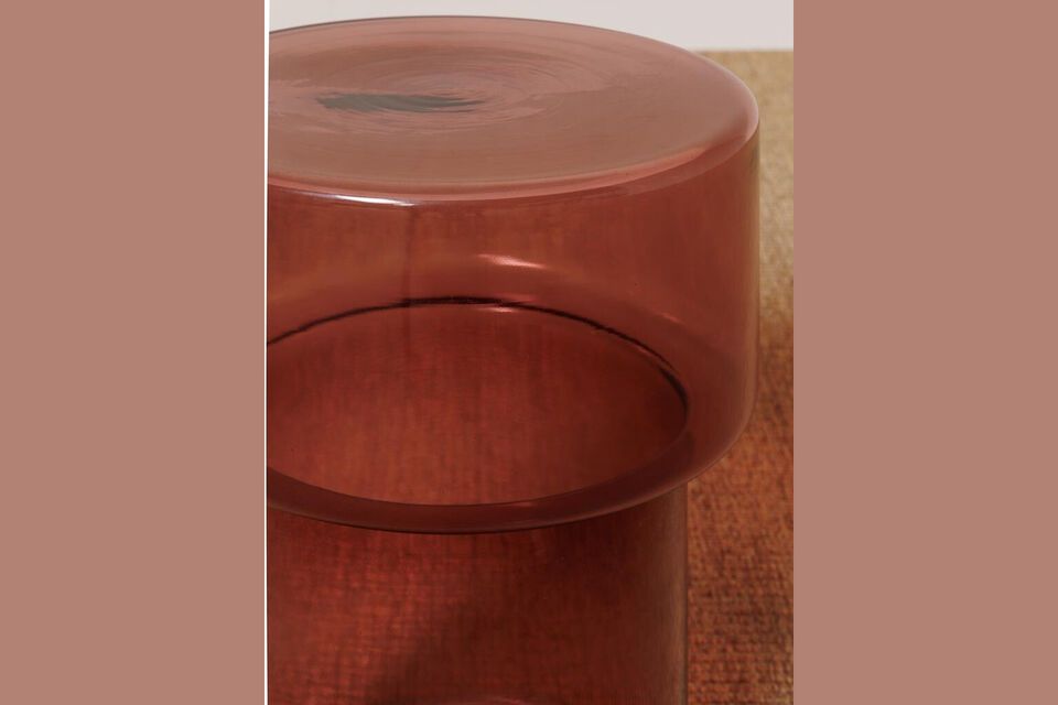 Discover elegance and modernity fused in our red glass accent table