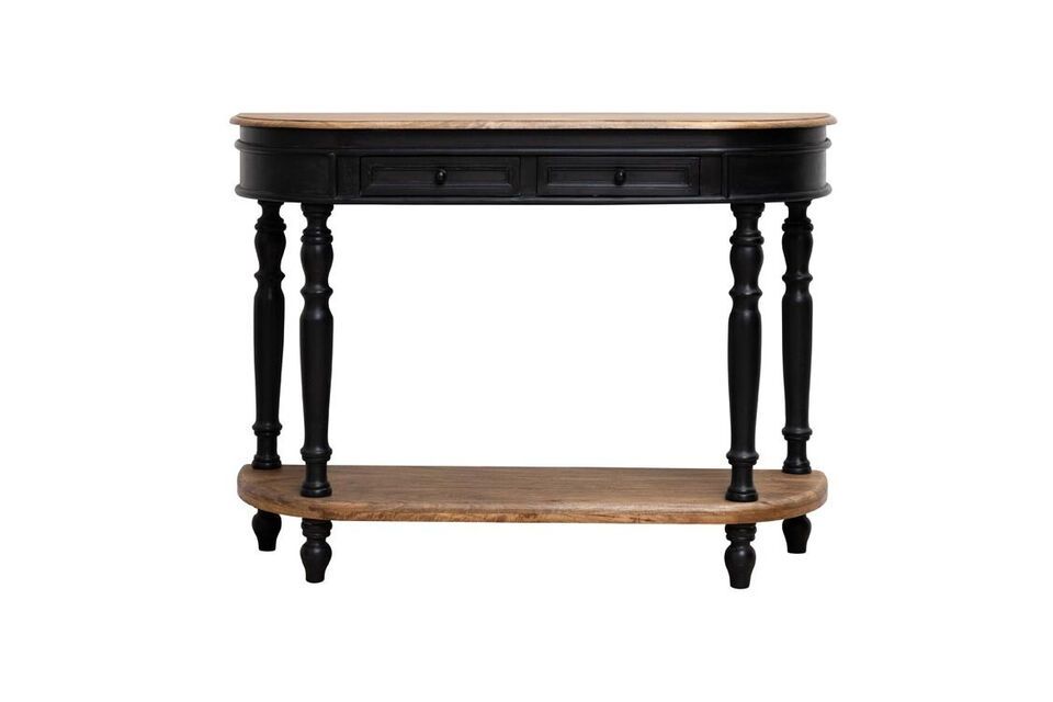 The mango wood console, stained black, offers a perfect marriage of functionality and elegance