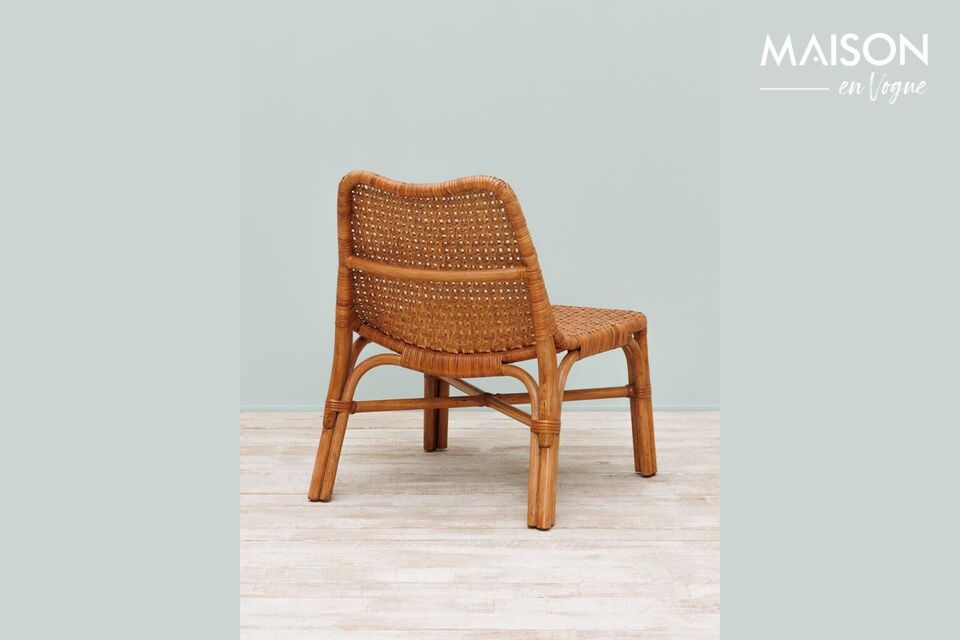 Embellish your space with the Newlake chair, a beige rattan centerpiece