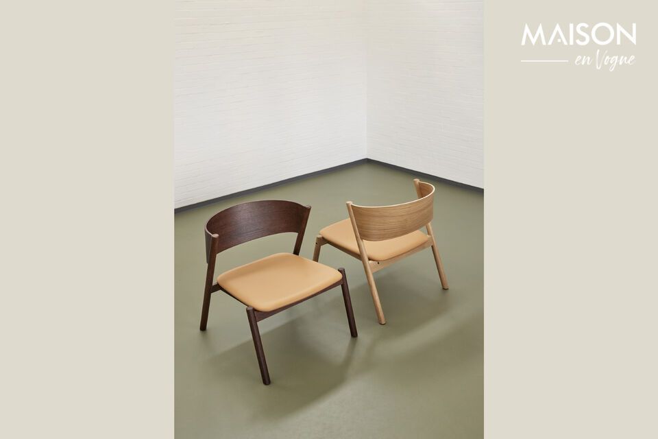 The Oblique light beech armchair is an invitation to comfort and style in your living space