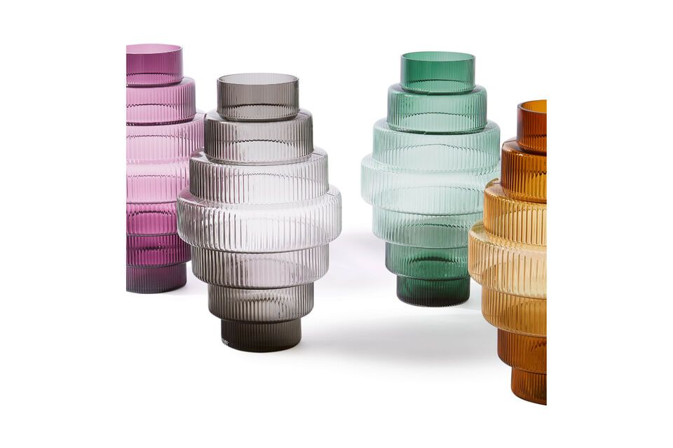 The artisanal manufacturing process ensures that each vase is unique