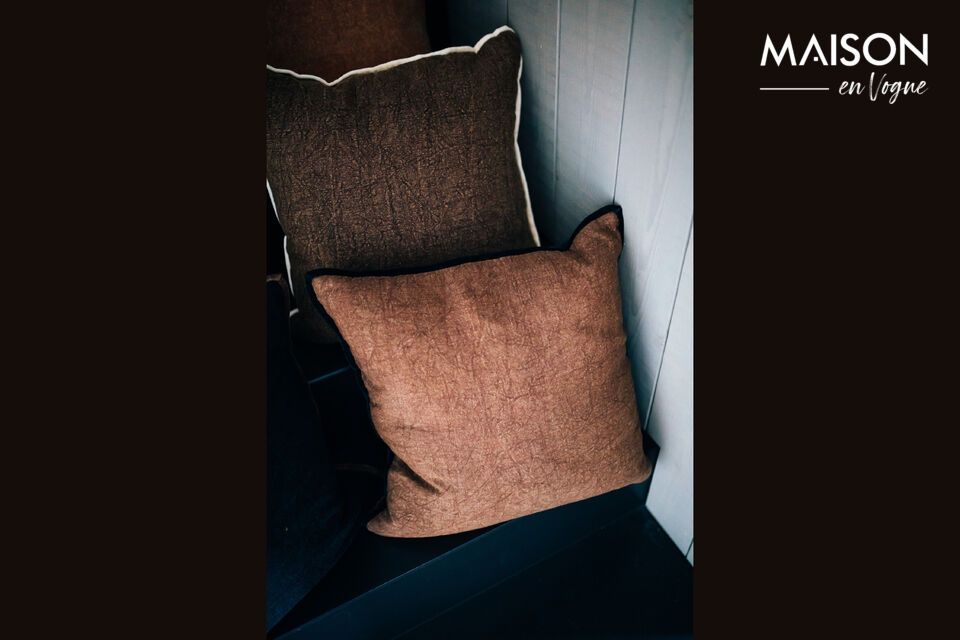 Discover the comfort and subtlety of the Opposites brown cotton cushion