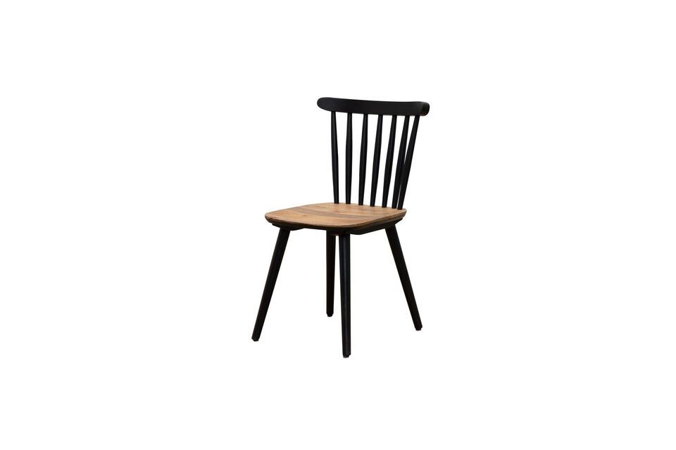 The sophisticated black hue and sleek design of the Paulin wooden chair add a touch of understated