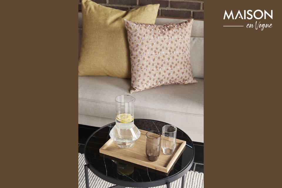 The Poppy cushion in mustard yellow adds a dynamic note to your decor