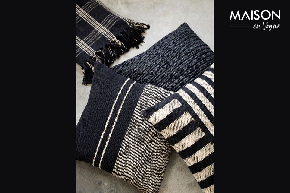 Bring a touch of natural elegance and sophistication to your home with the Ratton black cotton and