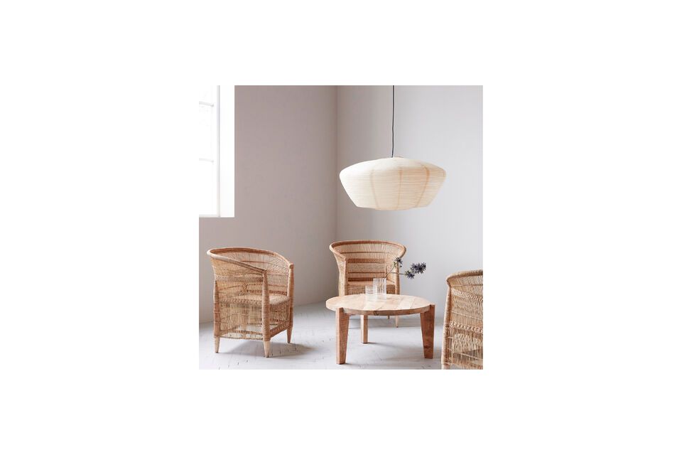 Discover the Rika armchair, designed to enrich your living space with a touch of nature