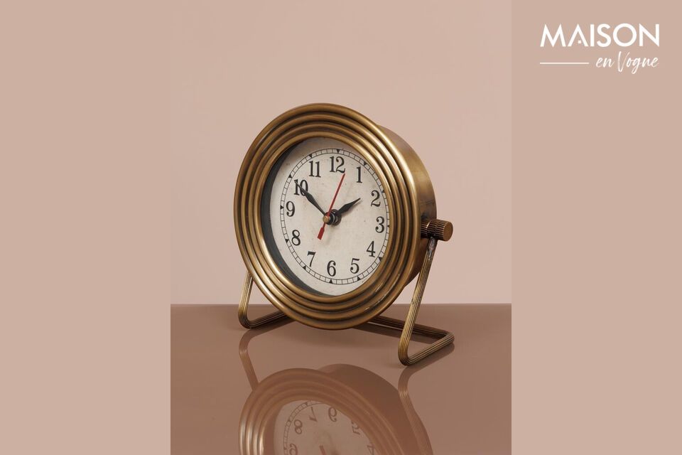 Add functionality and elegance with this golden clock.